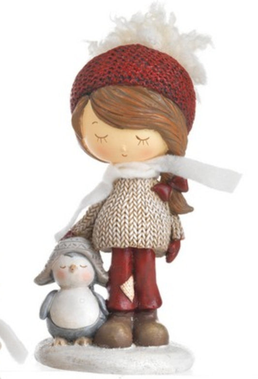 Bimba con pinguino
