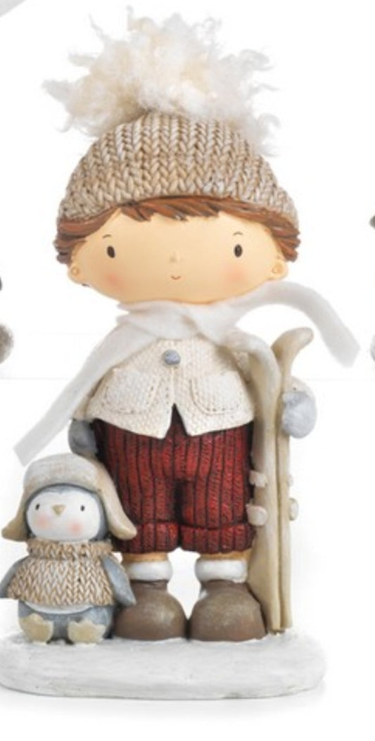 Bimbo con pinguino