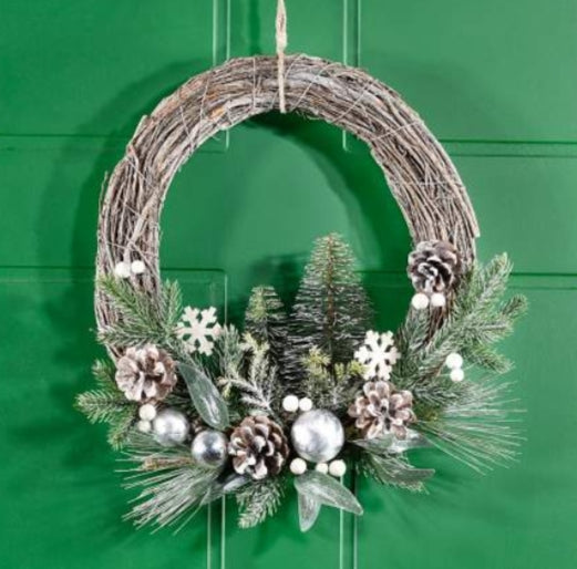 Ghirlanda in legno fuori porta Natale